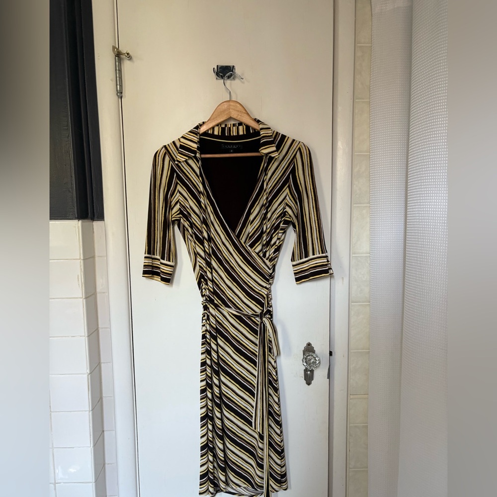 Wrap dress. 3/4 sleeve in brown yellow and white